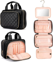 Black and pink travel makeup cases with a mirror on a white background